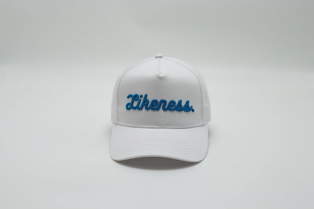 LIKENESS. cursive logo - LIKENE$$ Brand